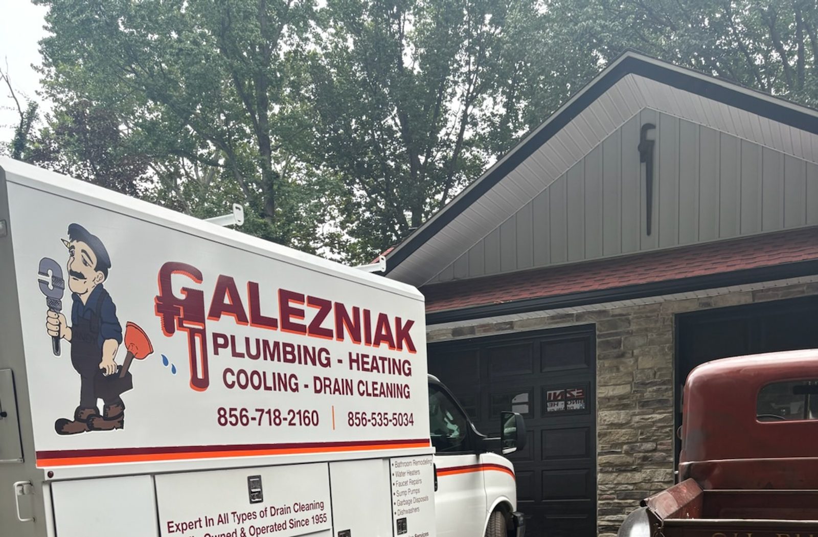 The Galezniak Plumbing, Heating, Cooling & Drain Cleaning service van at a job in Winslow, New Jersey